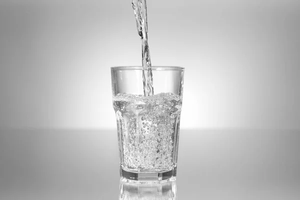 Pouring Water Glass Table — Stock Photo, Image