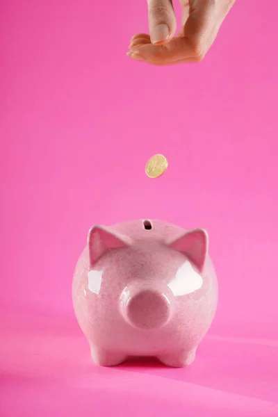 Woman Throwing Coin Piggy Bank Color Background — Stock Photo, Image