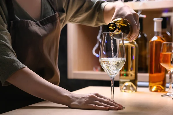 Female Barman Pouring Wine Bottle Glass Counter — Stock Photo, Image