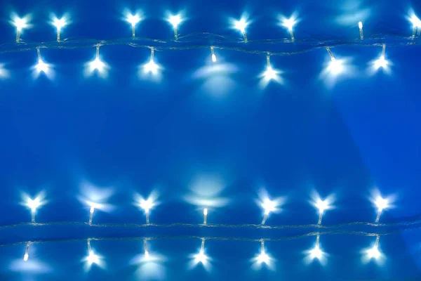 Mavi Arka Plan Üstten Görünüm Noel Işıkları — Stok fotoğraf