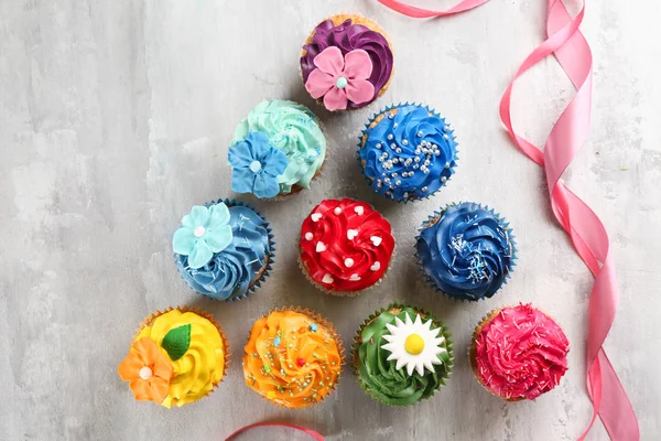 Tasty Colorful Cupcakes Grey Background — Stock Photo, Image