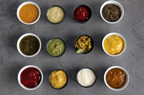 Different Tasty Sauces Bowls Grey Table — Stock Photo, Image