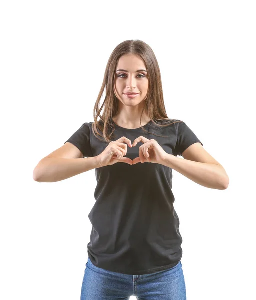 白い背景の上に彼女の手でスタイリッシュな シャツ作る心の若い女性 — ストック写真