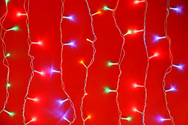 Christmas Lights Red Background Top View — Stock Photo, Image