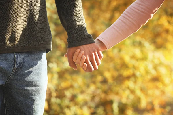 Loving Young Couple Holding Hands Outdoors — Stock Photo, Image