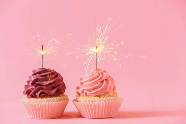 Tasty Cupcakes Sparklers Color Background — Stock Photo, Image