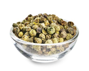 Baharat beyaz arka plan üzerinde bir cam kase