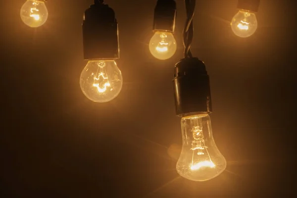 Glowing Light Bulbs Dark Background — Stock Photo, Image