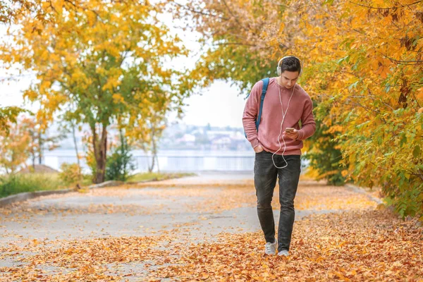 Young Man Listening Music Autumn Park — Stock Photo, Image