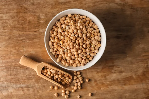 Bowl Scoop Dry Chickpeas Wooden Table — Stock Photo, Image