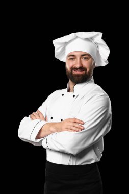 Koyu arka plan üzerinde erkek Şef