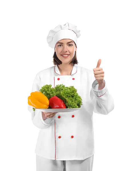 白い背景の上の野菜と若い女性シェフ — ストック写真