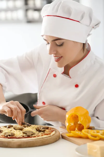 Young Female Chef Cooking Tasty Pizza Kitchen — Stock Photo, Image
