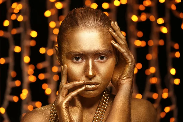 Beautiful Young Woman Golden Paint Her Body Defocused Lights — Stock Photo, Image