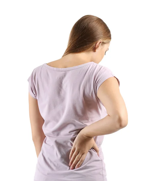 Mujer Joven Que Sufre Dolor Espalda Sobre Fondo Blanco — Foto de Stock