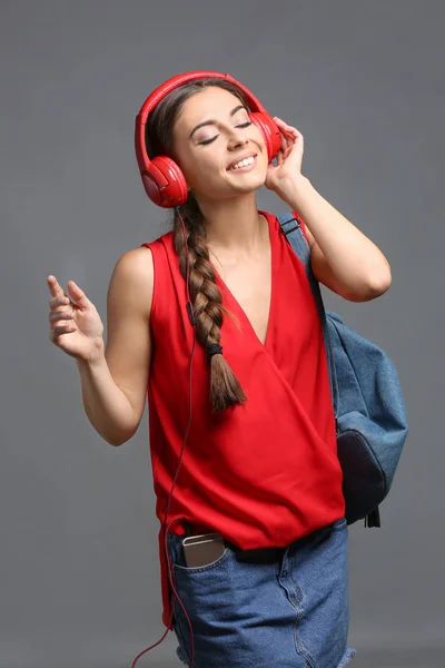 Beautiful Woman Listening Music Grey Background — Stock Photo, Image