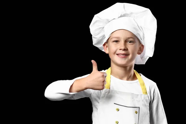 Lindo Pequeño Chef Mostrando Pulgar Hacia Arriba Fondo Oscuro — Foto de Stock