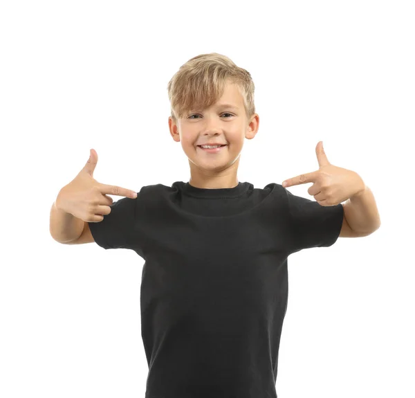 Lindo Chico Apuntando Camiseta Sobre Fondo Blanco —  Fotos de Stock