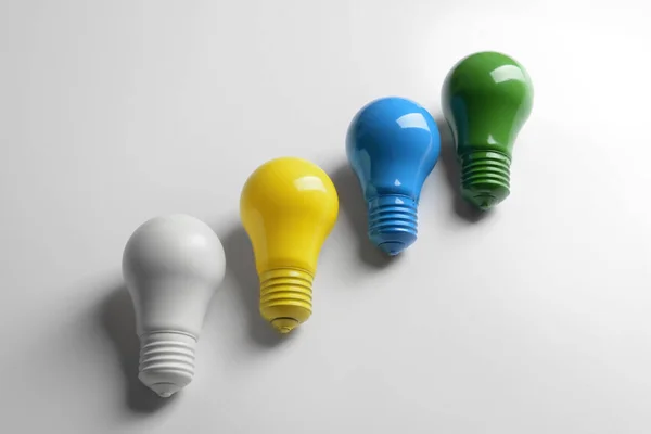 Painted Light Bulbs White Background — Stock Photo, Image