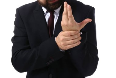 Beyaz arka plan, closeup bileğinde acı acı işadamı