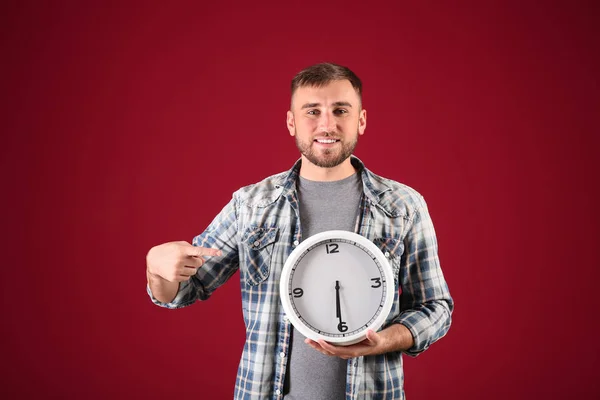 Young Man Clock Color Background — Stock Photo, Image