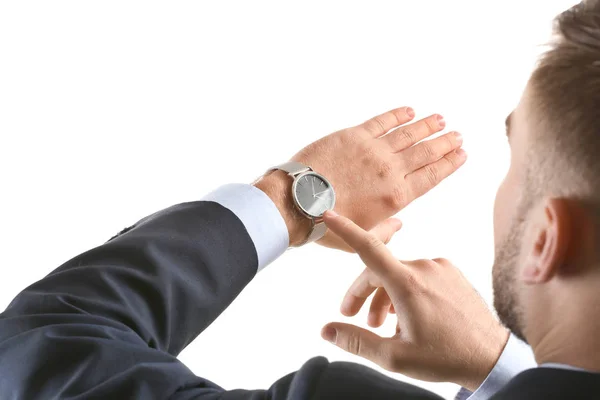 Geschäftsmann Schaut Auf Seine Uhr Auf Weißem Hintergrund — Stockfoto