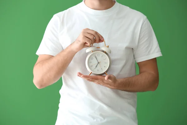 Young Man Alarm Clock Color Background — Stock Photo, Image