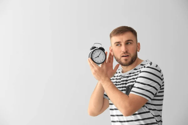 Young Man Alarm Clock White Background — Stock Photo, Image