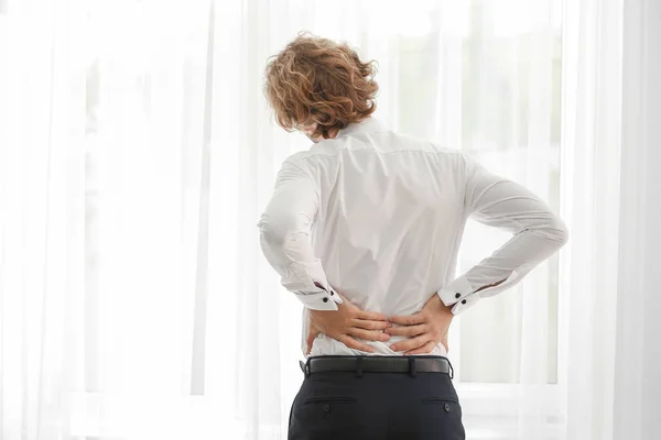 Young Businessman Suffering Back Pain Window — Stock Photo, Image