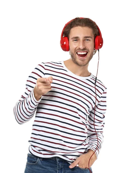 Joven Escuchando Música Sobre Fondo Blanco —  Fotos de Stock