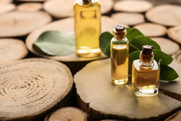 Bottles Eucalyptus Essential Oil Wooden Background — Stock Photo, Image