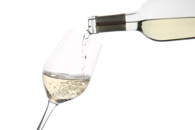 Pouring of wine from bottle into glass on white background clipart