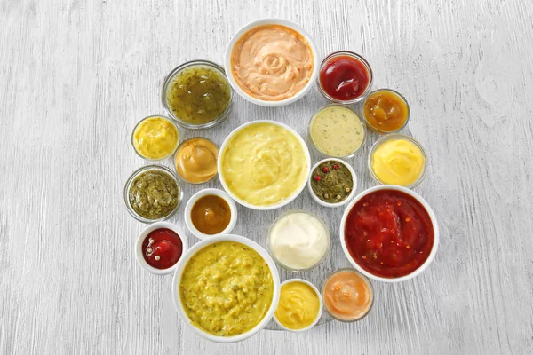 Different Tasty Sauces Bowls White Wooden Table — Stock Photo, Image