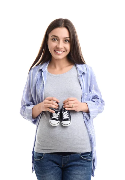 Schöne Schwangere Frau Mit Babystiefeln Auf Weißem Hintergrund — Stockfoto