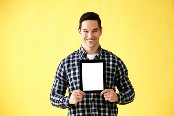 Young Man Tablet Computer Color Background — Stock Photo, Image