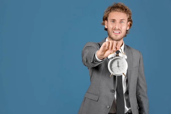 Stressed Businessman Alarm Clock Blue Background — Stock Photo, Image