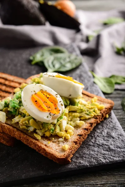 Toasted Bread Cut Boiled Egg Avocado Slate Plate — Stock Photo, Image