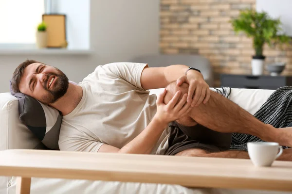 Man Suffering Leg Pain Home — Stock Photo, Image