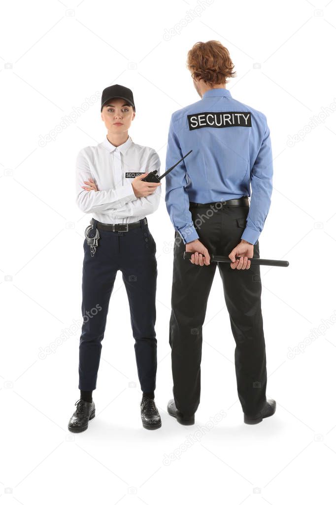 Male and female security guards on white background