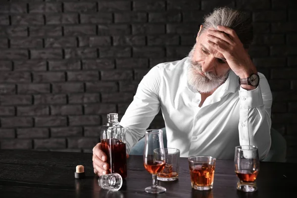 Depressed Senior Man Drinking Whiskey Table Dark Background — Stock Photo, Image