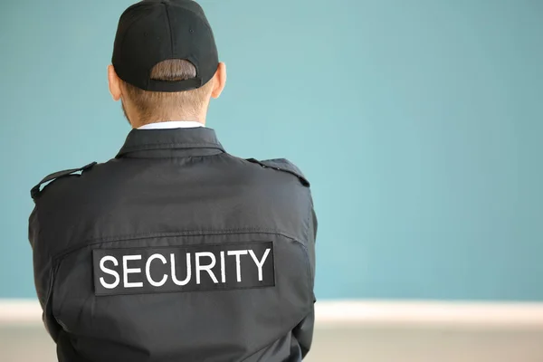 Male Security Guard Indoors Back View — Stock Photo, Image