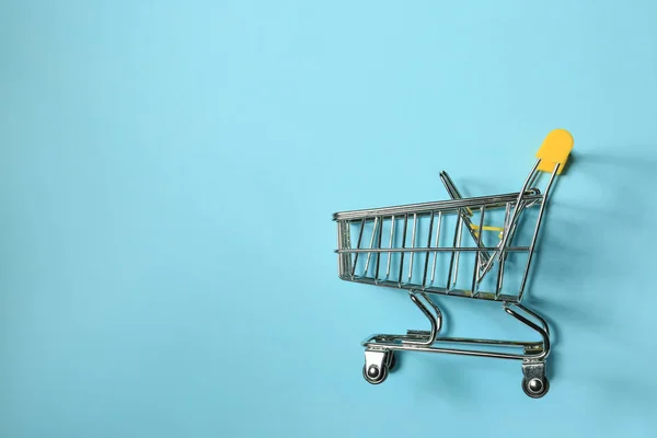 Empty Shopping Cart Color Background — Stock Photo, Image