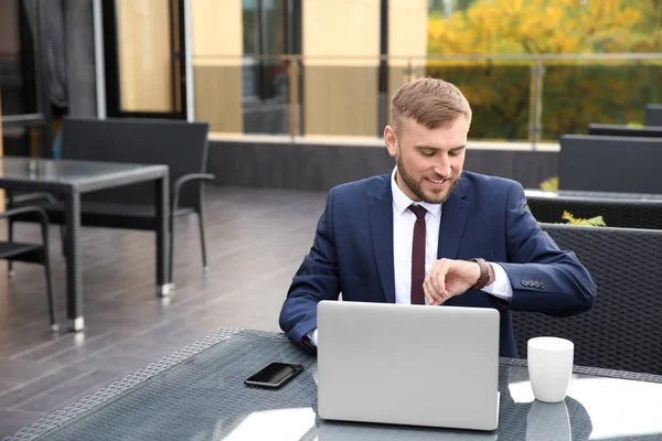 Businessman Looking Watch While Working Laptop Cafe — Stock Photo, Image