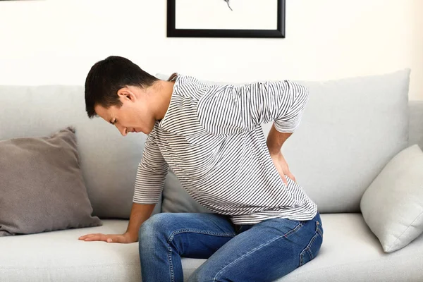 Young Man Suffering Back Pain Home — Stock Photo, Image