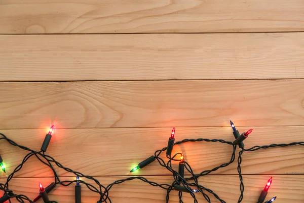 Luci Natale Incandescenti Sul Tavolo Legno — Foto Stock