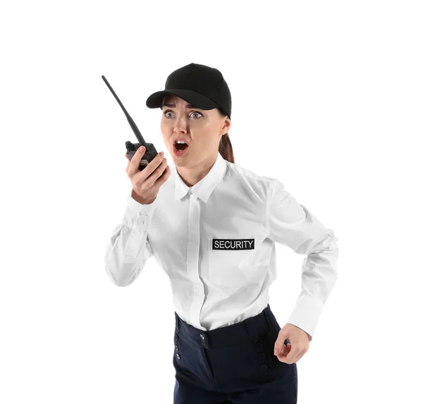 Female security guard with portable radio transmitter on white background