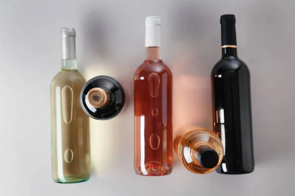 Bottles Different Kinds Wine Grey Background — Stock Photo, Image
