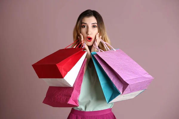 Surprised Young Woman Shopping Bags Color Background — Stock Photo, Image