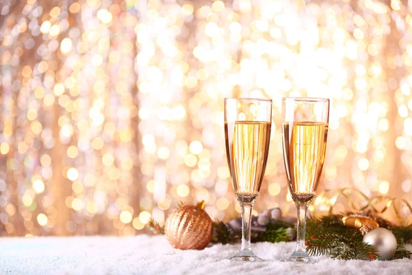 Glasses Champagne Christmas Decor Snow Blurred Lights — Stock Photo, Image