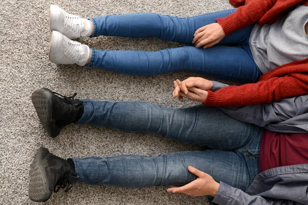 Loving Young Couple Holding Hands While Sitting Floor Home — Stock Photo, Image